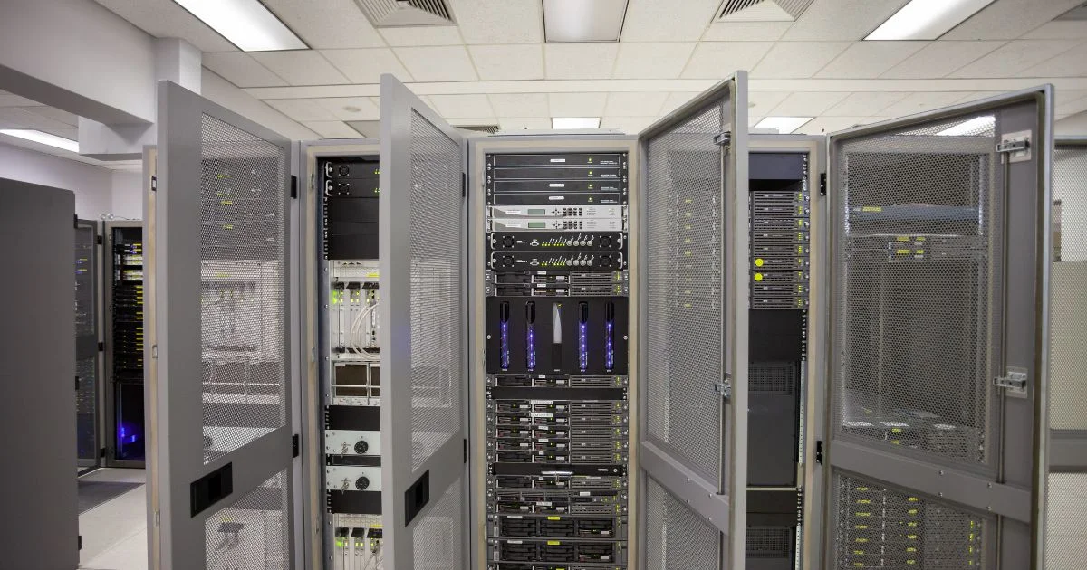Server room with open rack-mounted UPS systems.